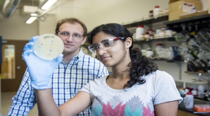Neha Prasad and Prof. Tim Wencewicz in the research lab