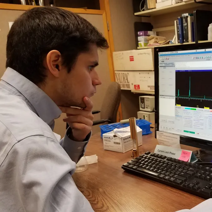 Khalid Mahmood analyzing NMR spectrum