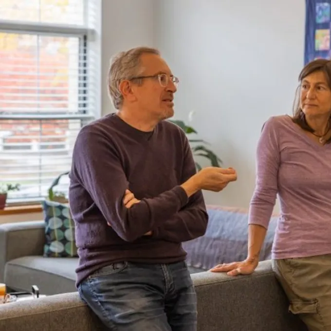 Faculty fellow William Tolman and chemistry department senior science editor Bonnie Gruen stand in the kitchen of their Nemerov apartment. (Photo by Brian Cui/Student Life)