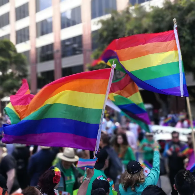 People celebrating Pride in San Francisco, California. Photo by y y on Unsplash.